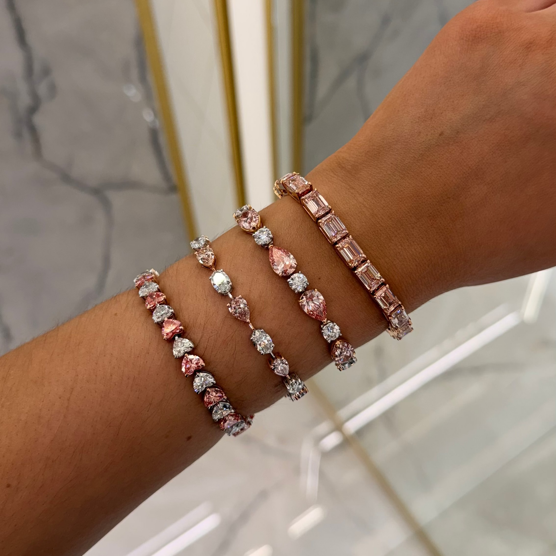 Liorabetha 32.29 Carat Emerald Cut Lab Grown Pink Diamond Tennis Bracelet in 14k Rose Gold On Hand