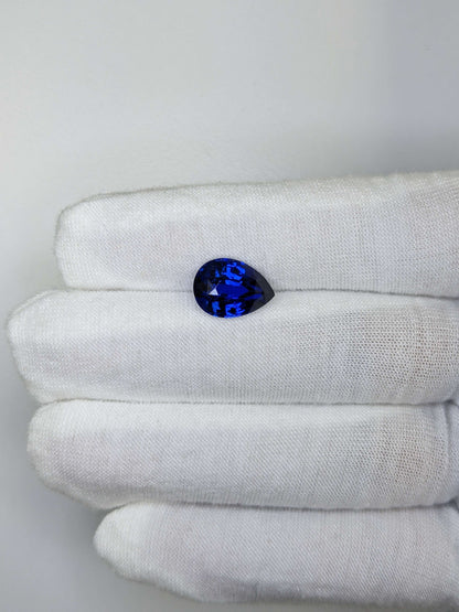 5.21 Carat Pear Cut Heat Royal Blue Sapphire Loose Gemstone On Hand