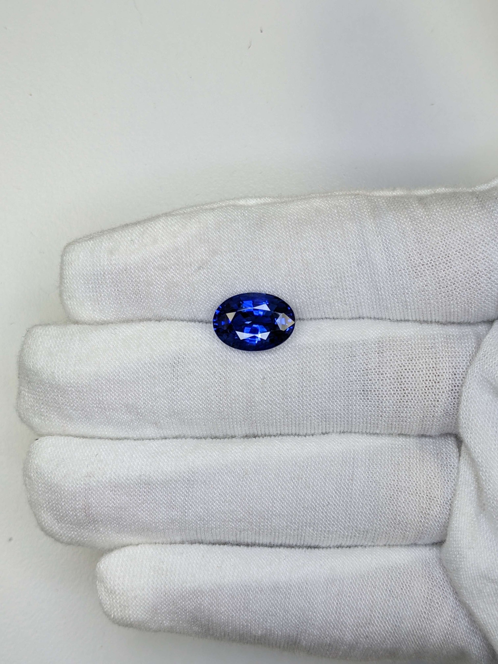5.95 Carat Oval Cut Heat Royal Blue Sapphire Loose Gemstone On Hand