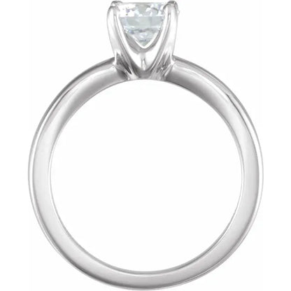 14k white gold ring with a clear gemstone on a white background