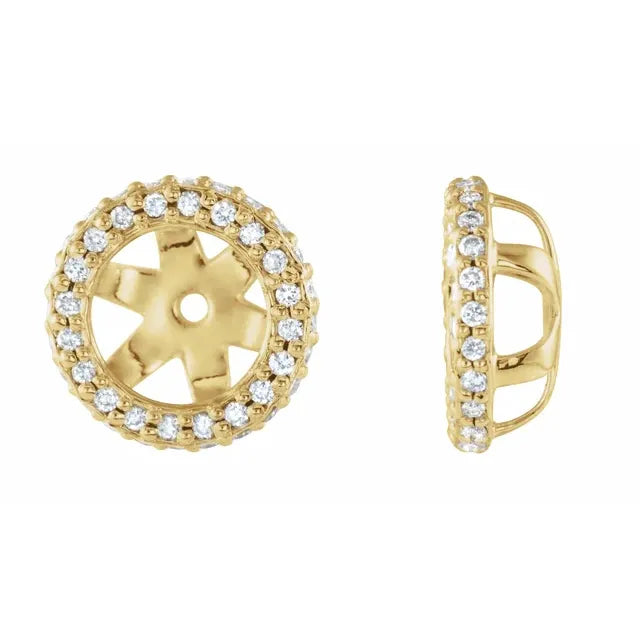 Gold earrings with clear diamonds on a white background