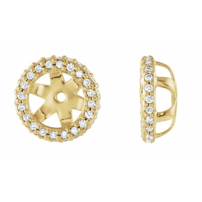 Gold earrings with clear diamonds on a white background