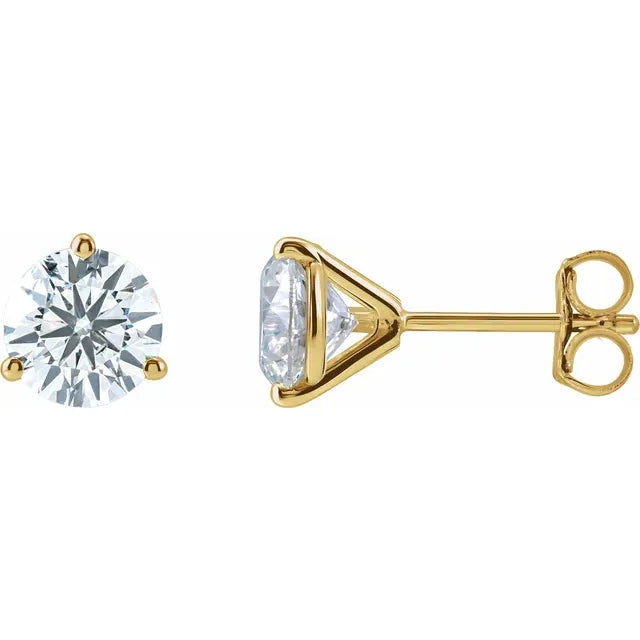 Gold stud earrings with round and triangle-shaped clear diamonds on a white background