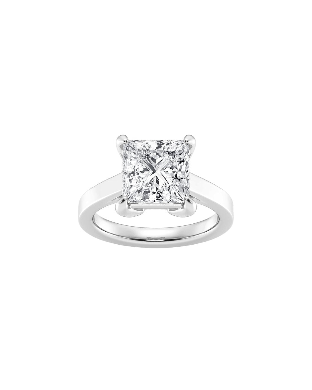 Diamond ring with a princess-cut gemstone on a white background