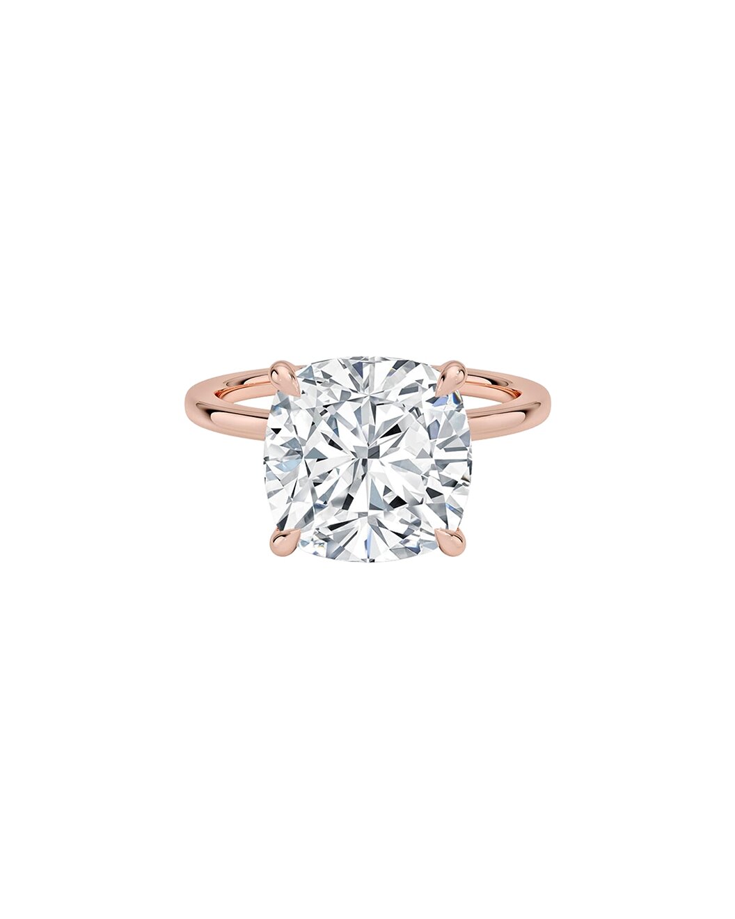 Rose gold ring with a large cushion cut diamond on a white background