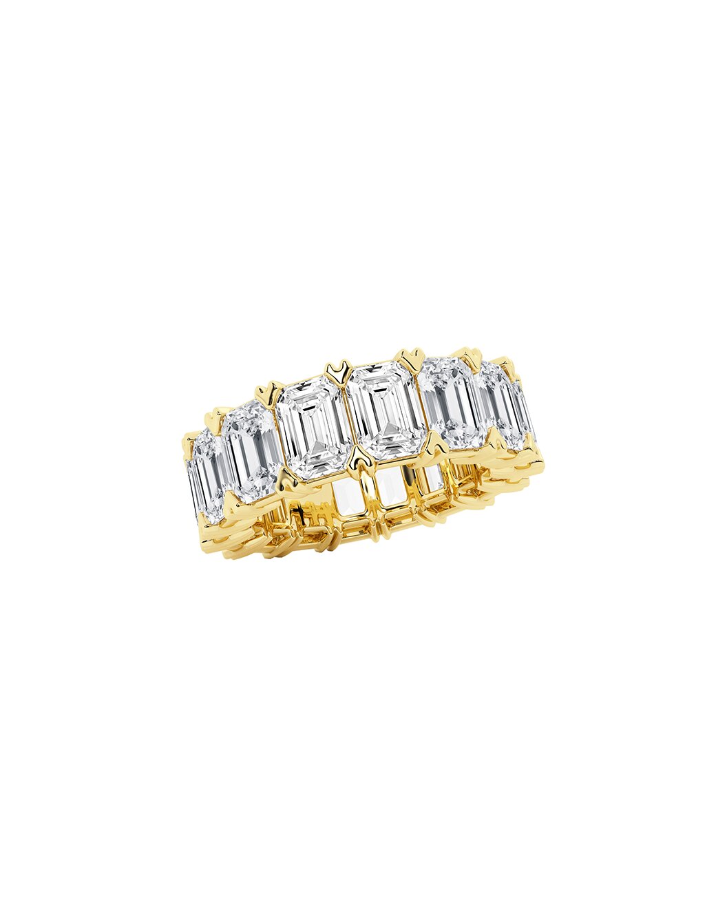 Gold ring with emerald-cut diamonds on a white background