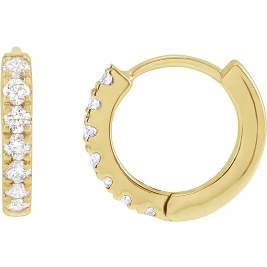 Gold hoop earrings with small diamonds on a white background