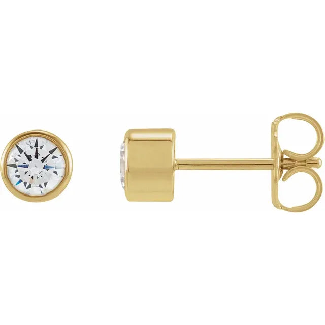 Gold stud earrings with clear diamonds on a white background