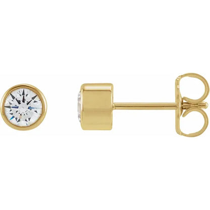 Gold stud earrings with clear diamonds on a white background