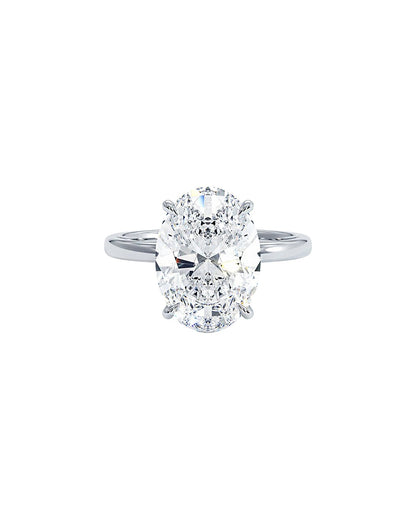 Diamond ring with a oval-shaped center stone on a white background