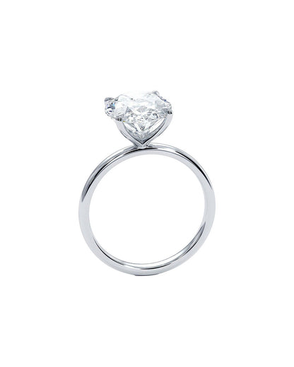 Diamond ring with an oval-shaped center stone on a white background