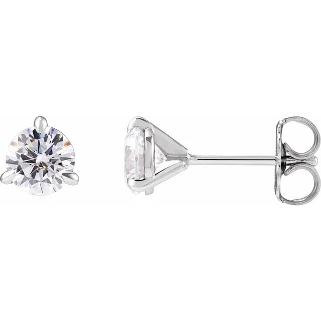 Pair of diamond stud earrings on a white background