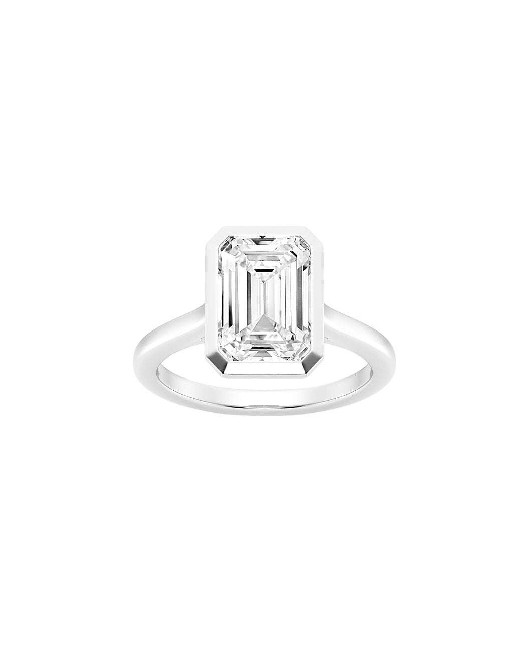 Diamond ring with emerald-cut gemstone on a white background