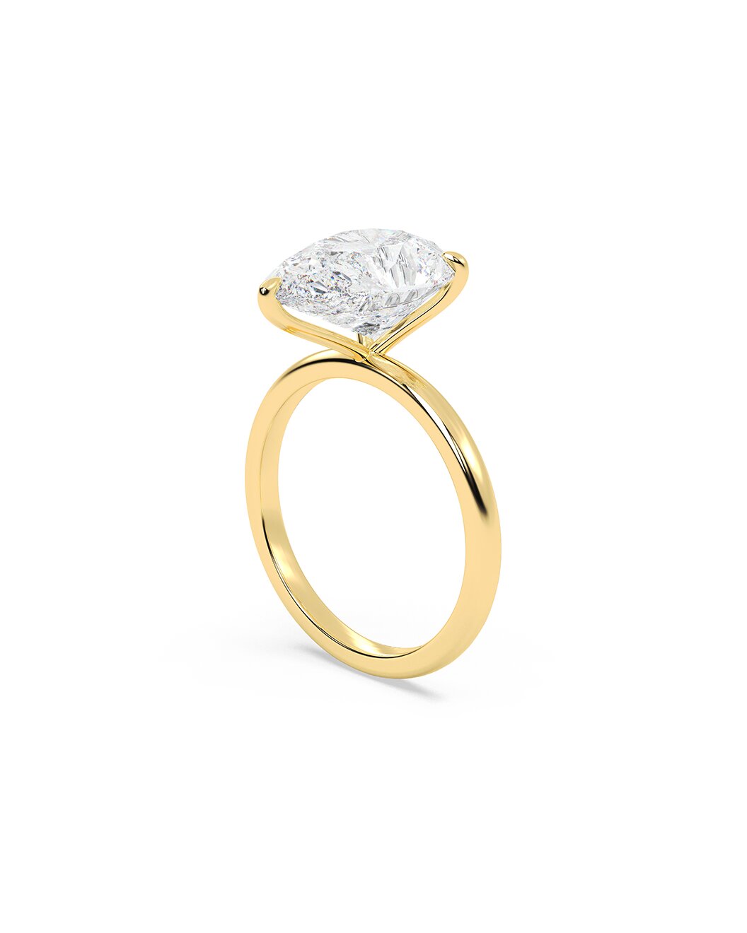 Leilah Gold ring with a large pear cut diamond on a white background