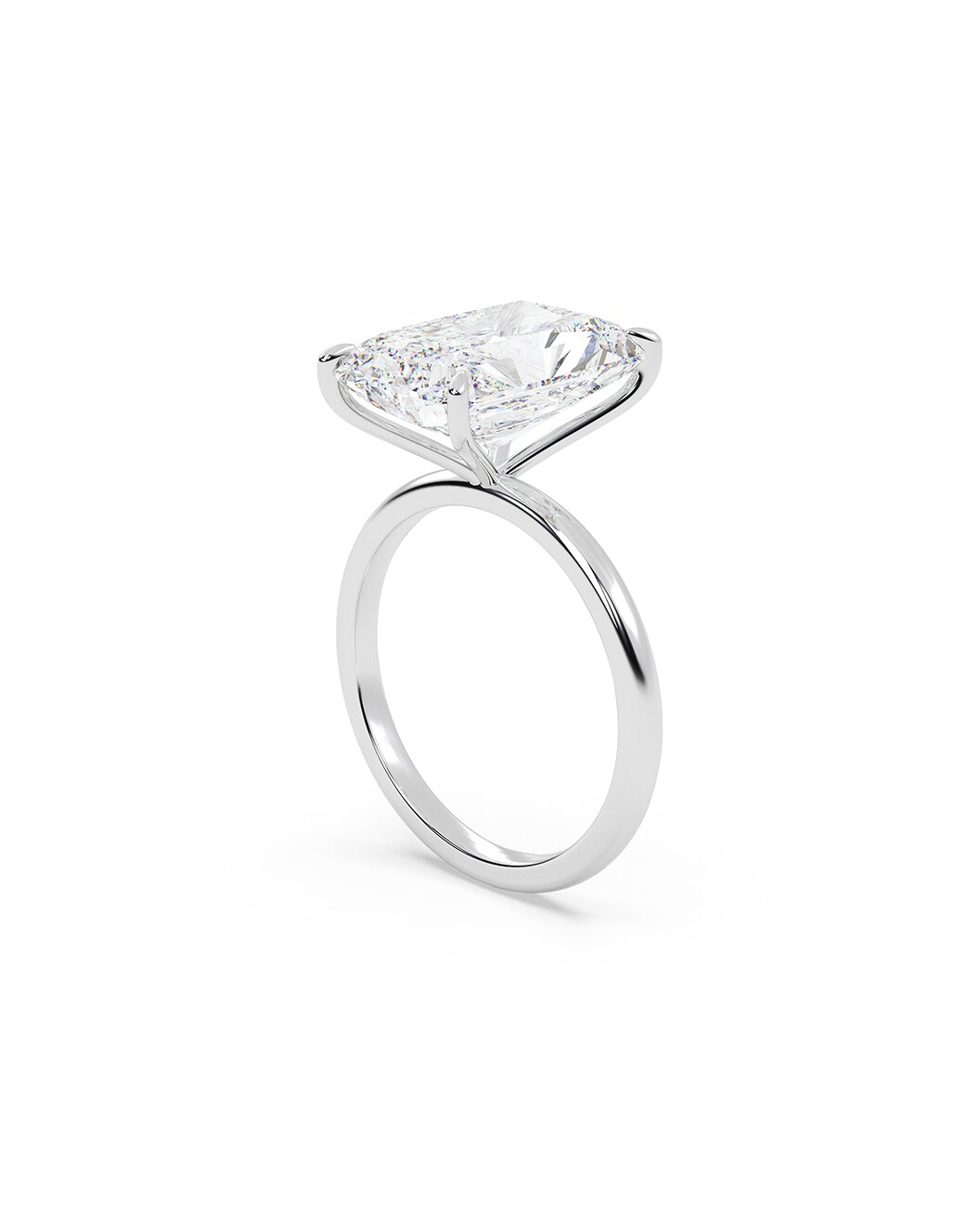 Diamond ring with a radiant cut stone on a white background