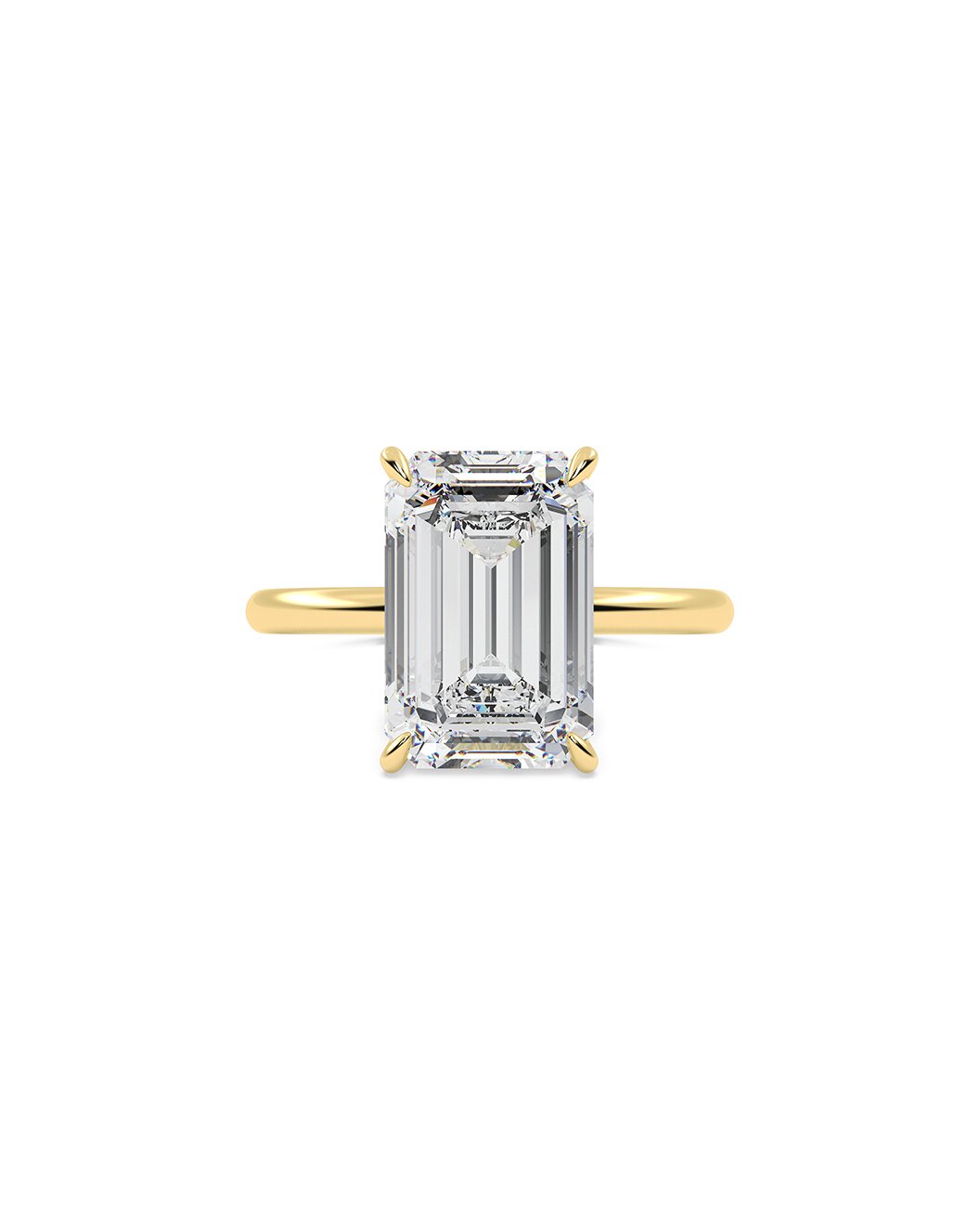 Gold ring with a large emerald-cut diamond on a white background