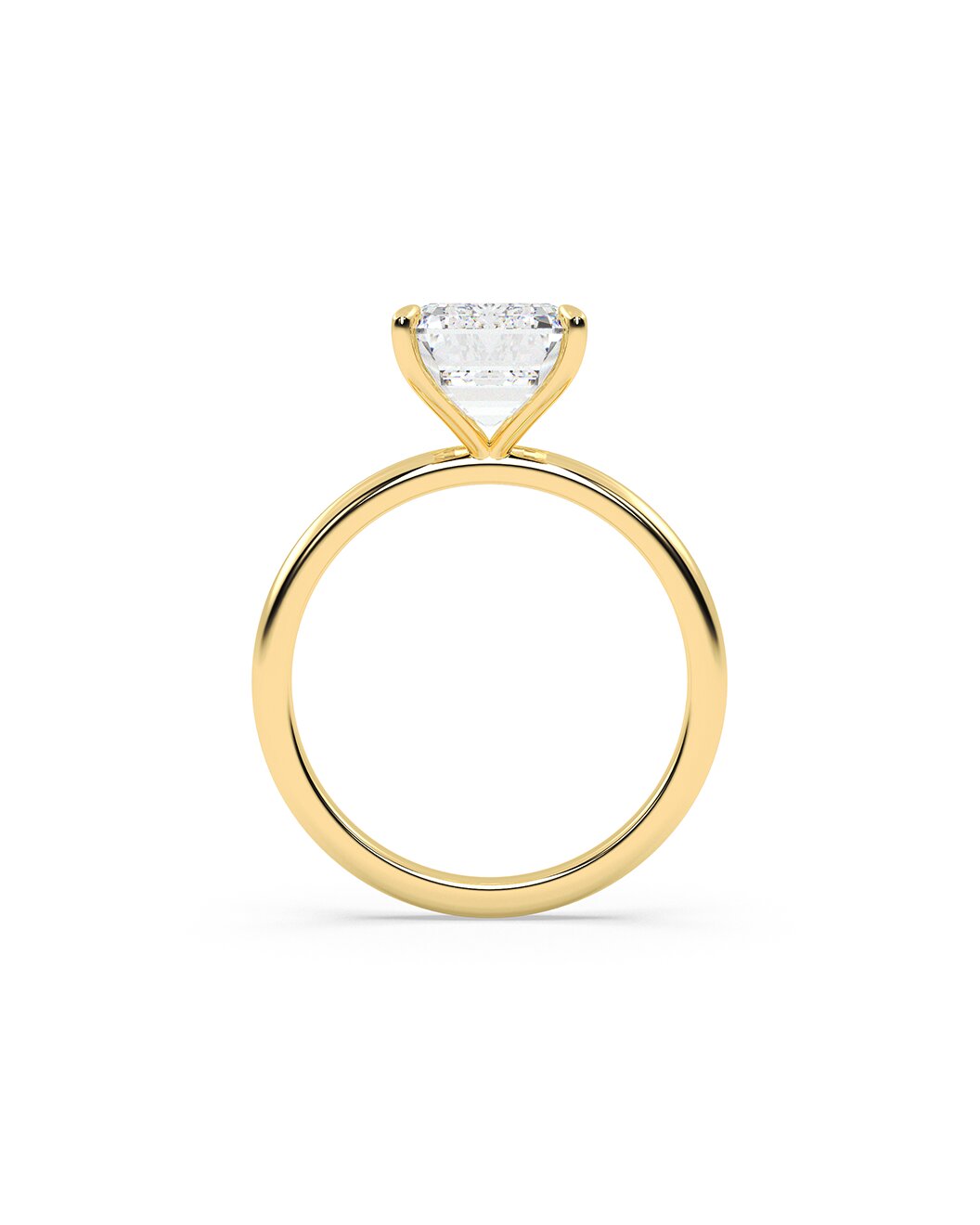Gold ring with a clear diamond on a white background
