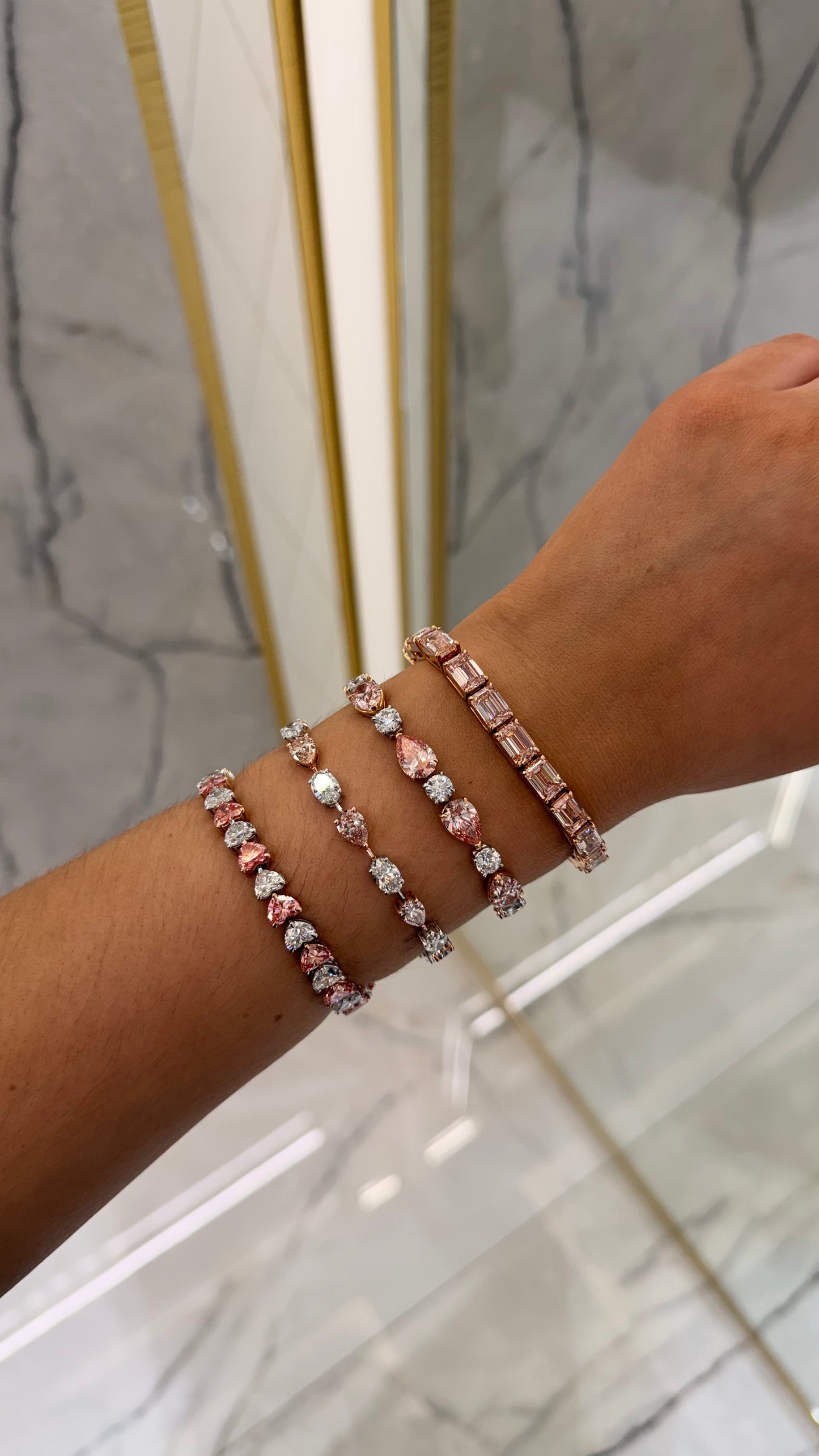 Levarina 22.42 Carat Heart Shape Lab Grown Pink Diamond Bracelet in 14k White Gold on hand