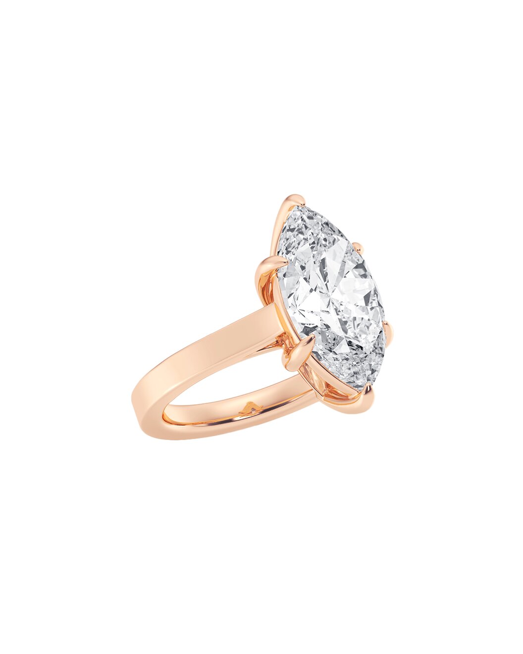 Rose gold ring with a pear-shaped diamond on a white background