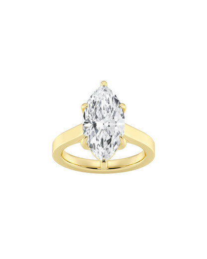 Gold ring with a marquise-shaped diamond on a white background