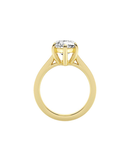 Gold ring with a diamond on a white background