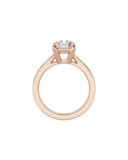 Rose gold ring with a diamond on a white background