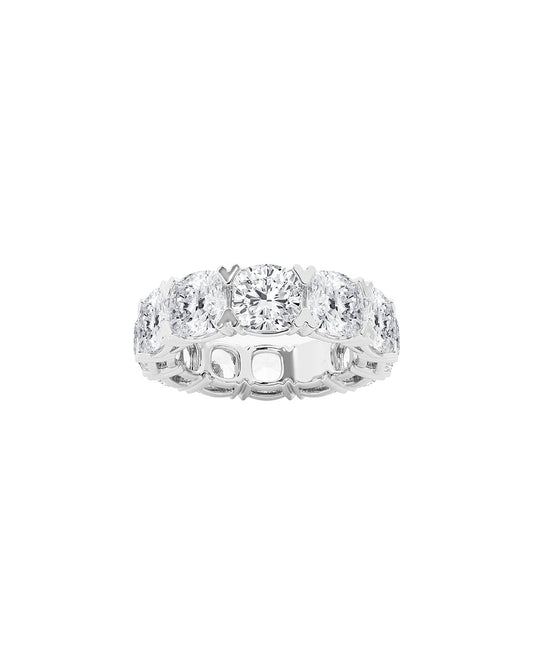 Platinum ring with multiple cushions diamonds on a white background