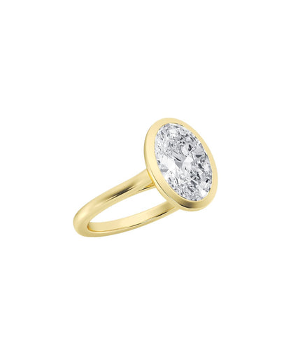 Gold ring with a diamond on a white background