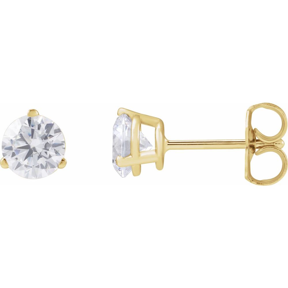 Gold stud earrings with clear diamonds on a white background