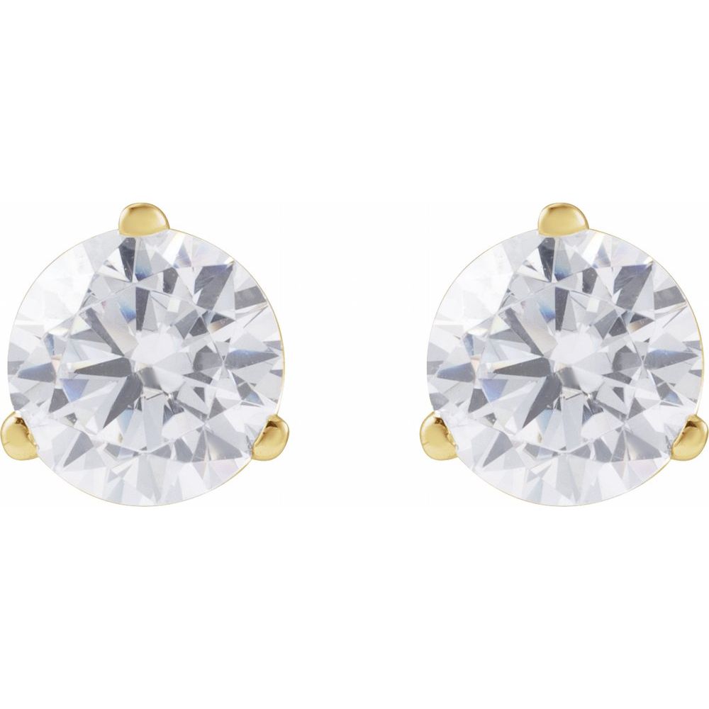 Gold earrings with clear diamonds on a white background