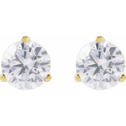 Gold earrings with clear diamonds on a white background