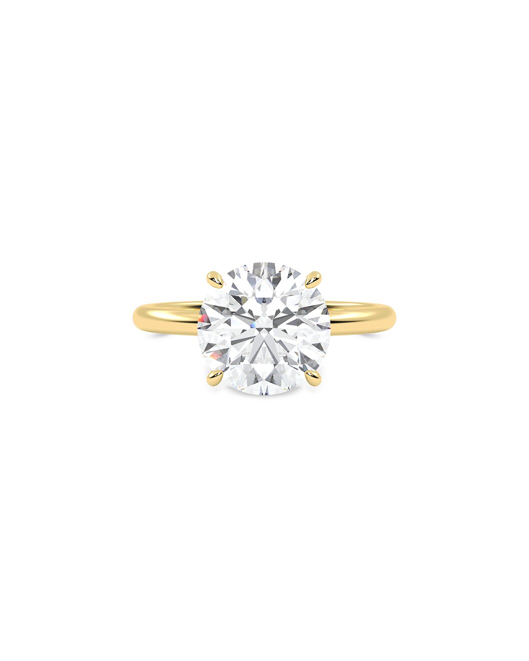 Gold ring with a large diamond on a white background