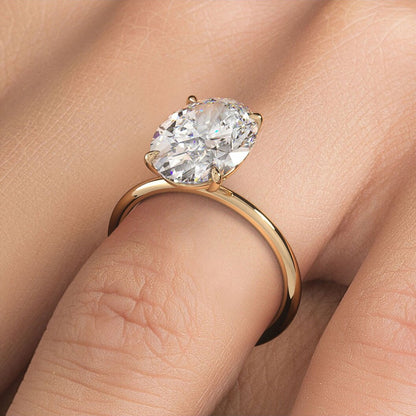 Lirissa 5 Carat Oval Cut Lab Grown Diamond Engagement Ring in 14k Yellow Gold On Model