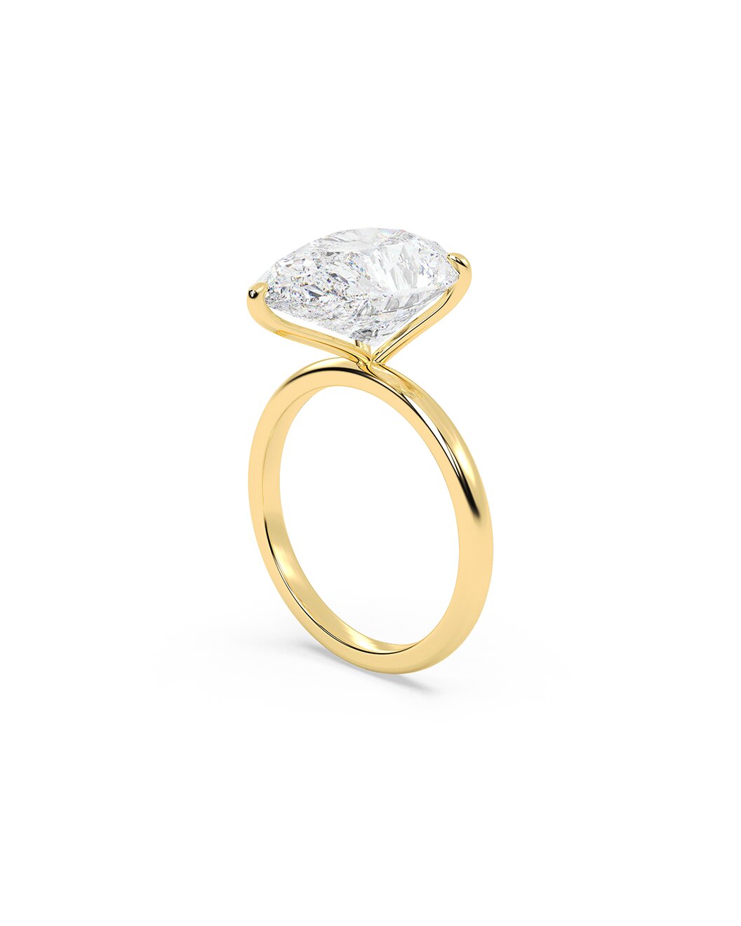 Yellow gold ring with a large diamond on a white background