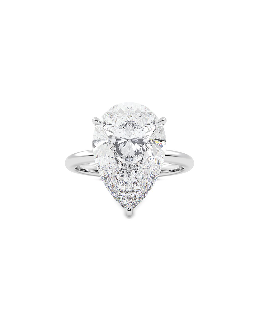 Pear-shaped diamond ring on a white background