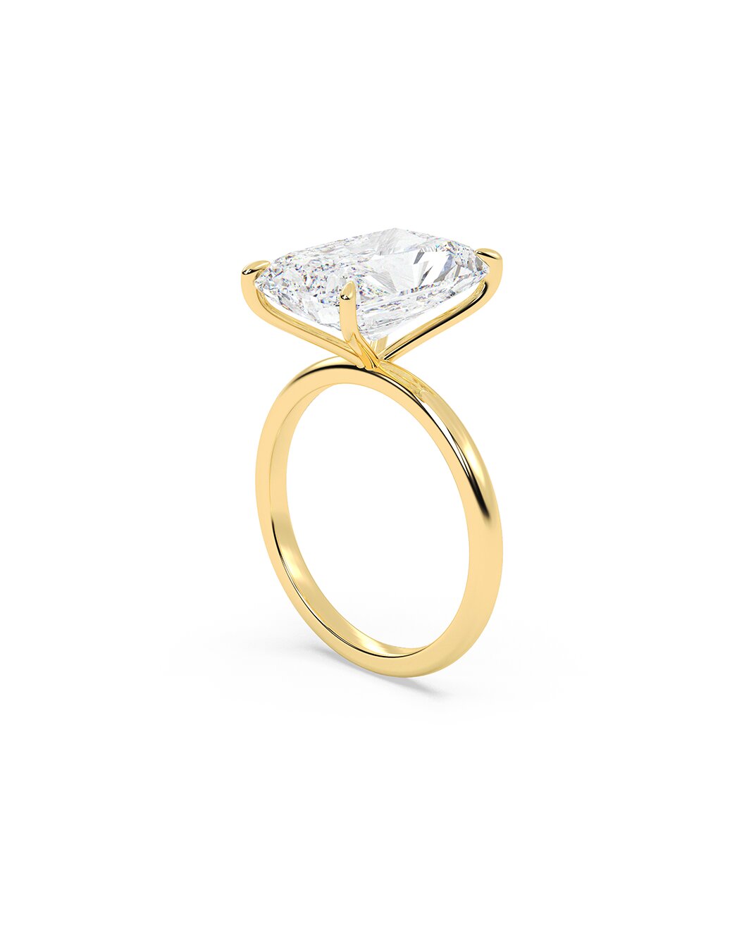Yellow Gold ring with a large diamond on a white background