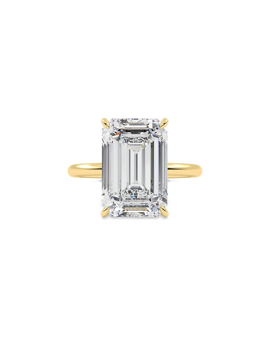 Yellow Gold ring with a large emerald-cut diamond on a white background