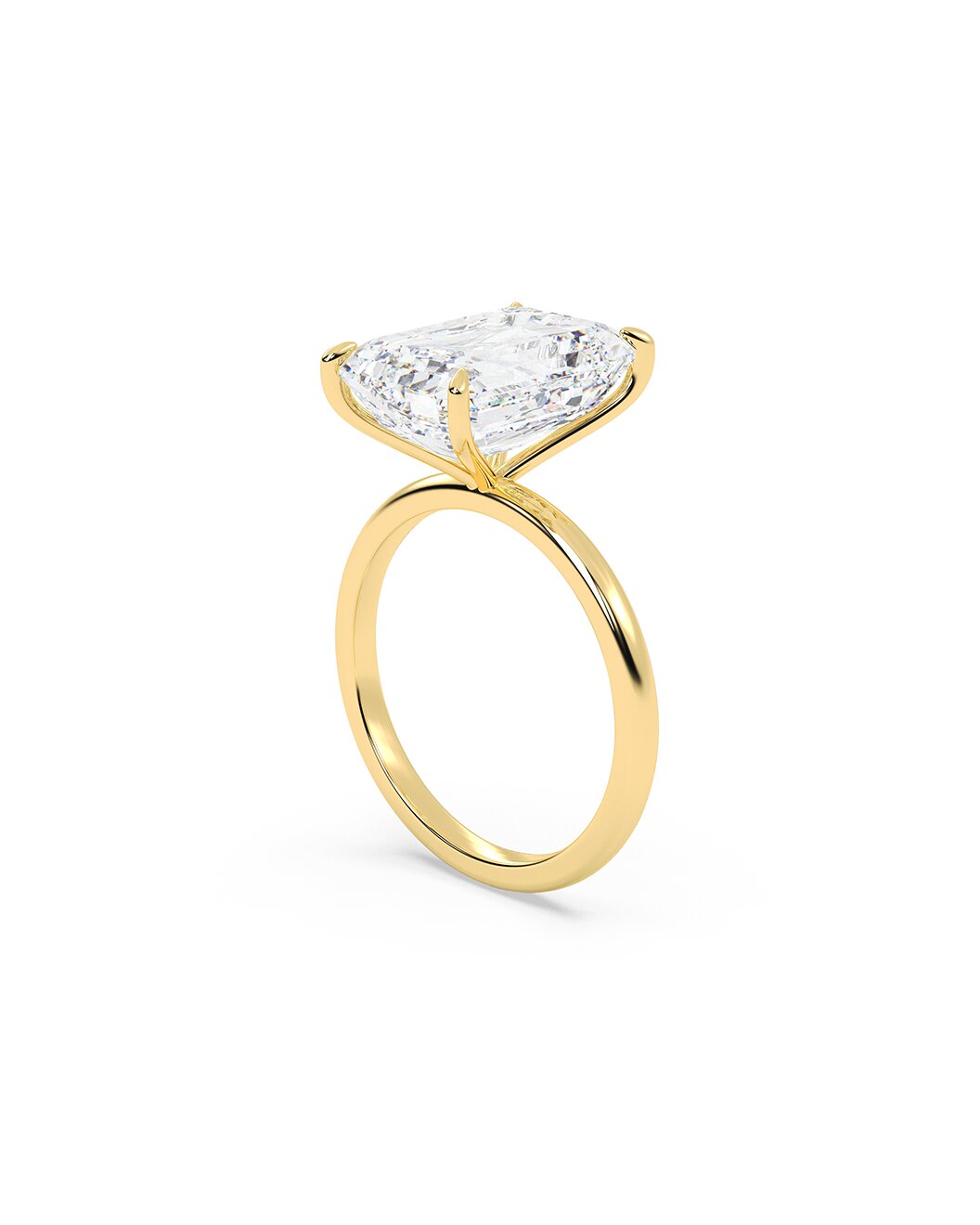 Yellow Gold ring with a large diamond on a white background