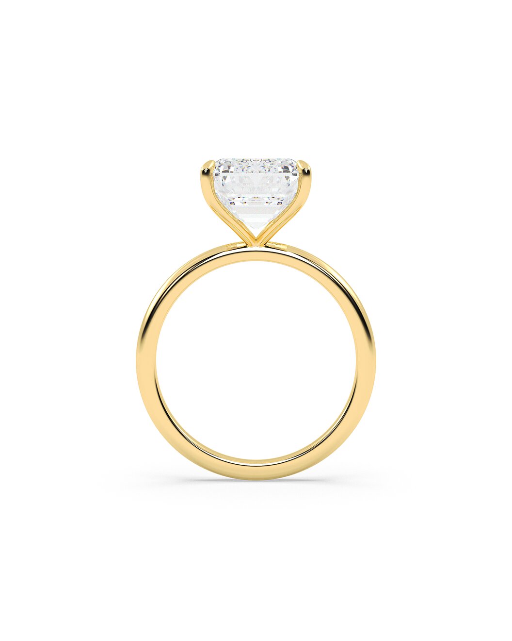 Yellow Gold ring with a heart-shaped diamond on a white background