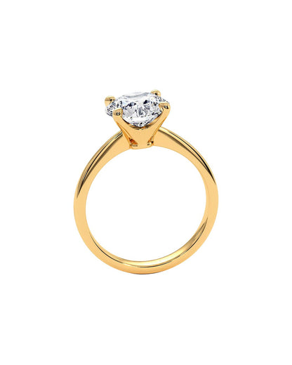 Gold ring with a diamond on a white background Side