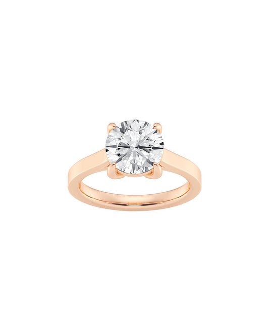 Rose gold ring with a diamond on a white background Front