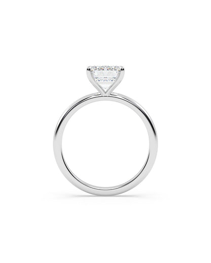 white gold ring with a diamond on a white background