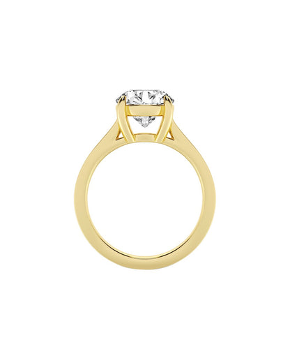 Gold ring with a diamond on a white background side