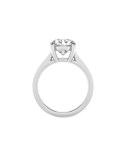 white gold ring with a diamond on a white background