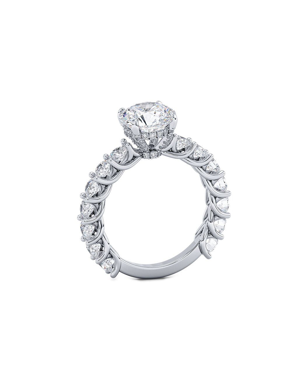 Diamond ring with a central gemstone and smaller diamonds on a white background