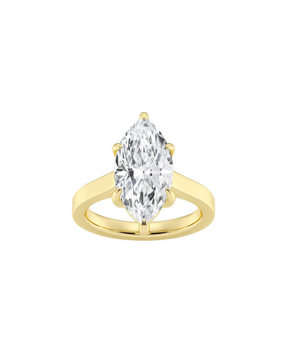 Yellow gold ring with a Marquise-shaped diamond on a white background