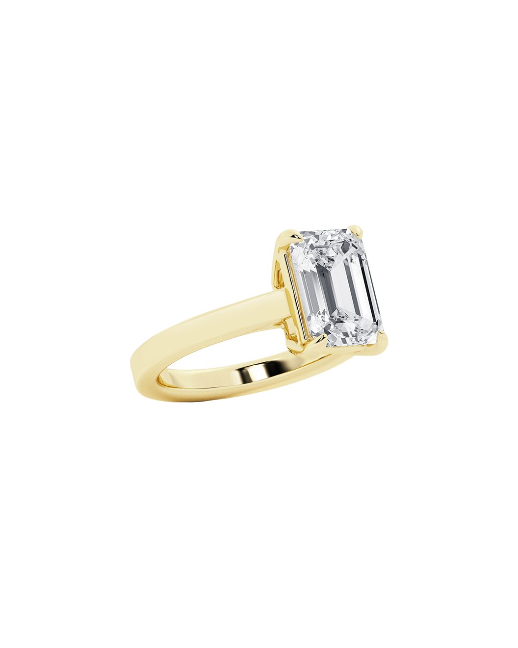 Yellow gold ring with an emerald cut diamond on a white background