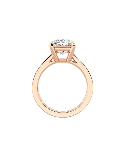 Rose gold ring with a diamond on a white background
