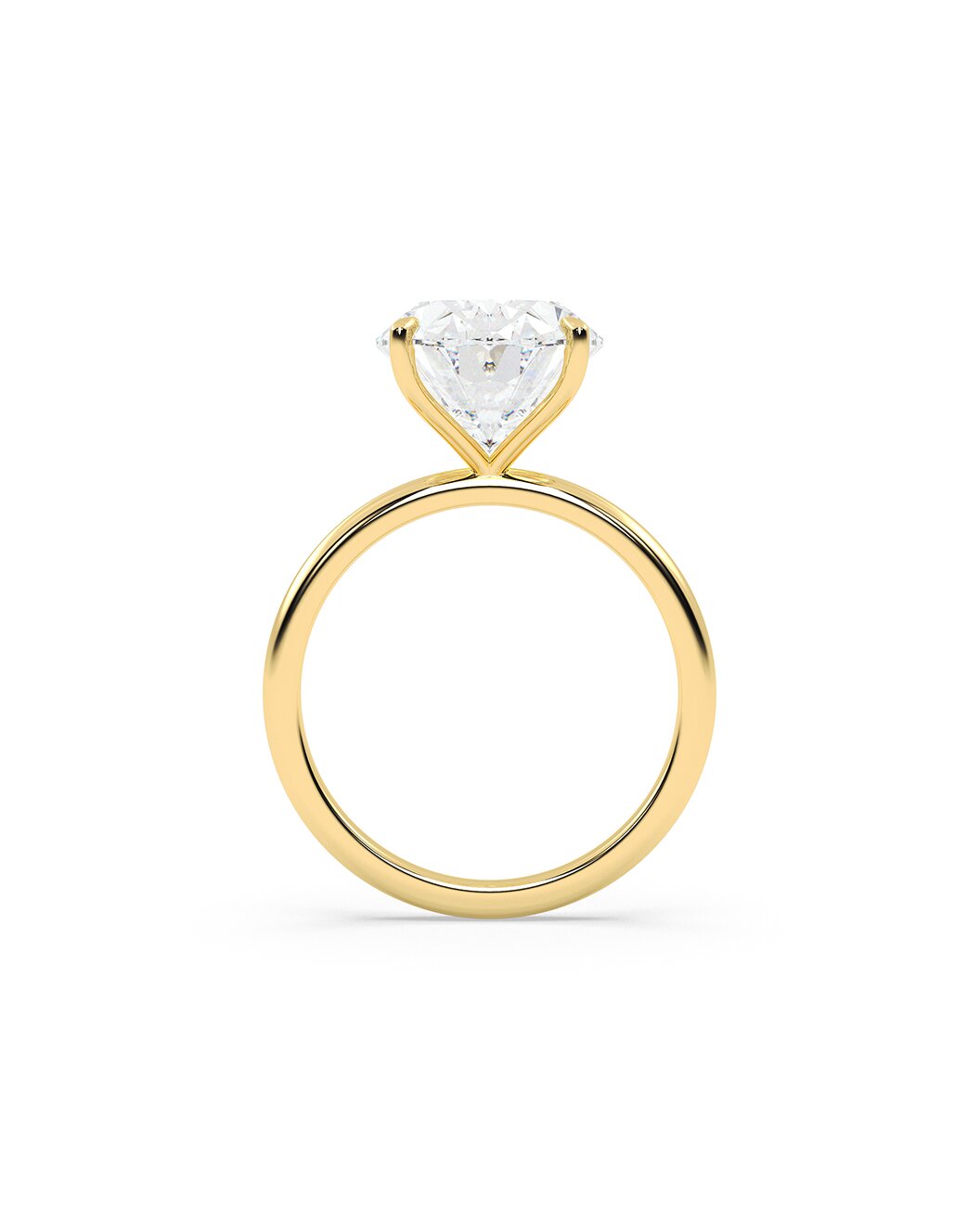 Yellow gold ring with a oval cut diamond on a white background