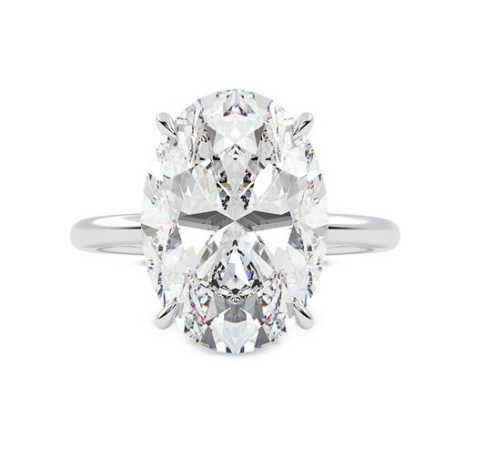 Diamond ring with three clear diamond on a white background